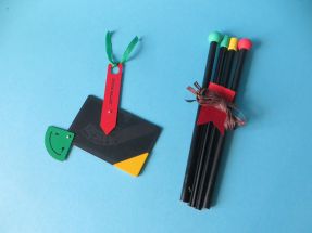 scale with pencils