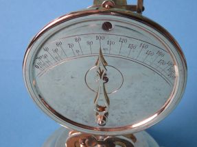 the pointer at 100 grams