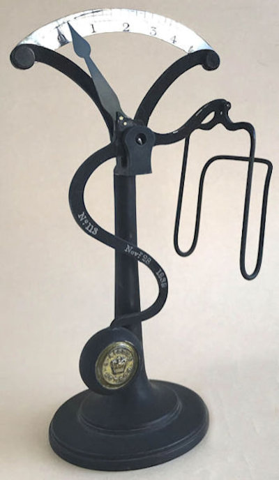 letter scale No. 113 in black with silver plated arc